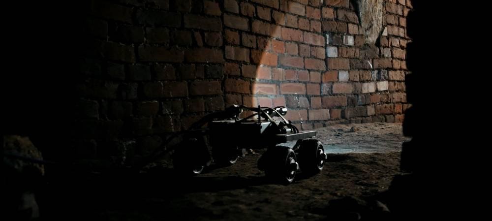 Leo Rover in a dark sewage